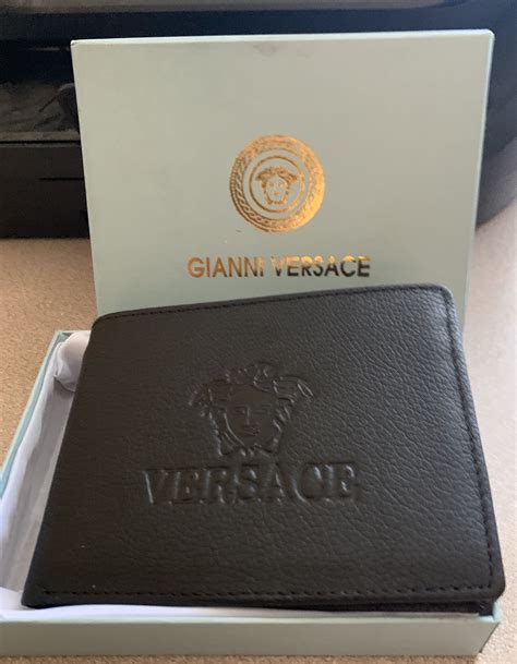 versace black zip around wallet|gianni versace wallet price.